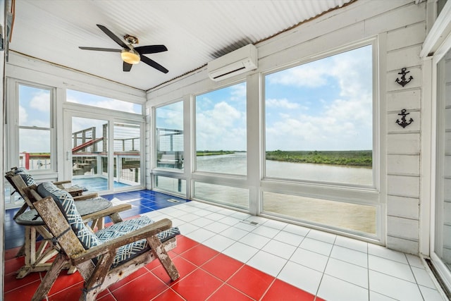 395 Redfish Dr, Freeport, TX 77541 - sunroom / solarium featuring a wall mounted air conditioner, a water view, and healthy amount of natural light