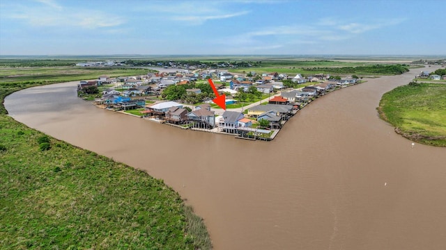 395 Redfish Dr, Freeport, TX 77541 - aerial view of residential area featuring a nearby body of water