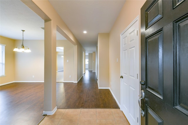 18015 Secret Branch Ln, Cypress, TX 77433 - foyer entrance with light wood-type flooring, a chandelier, baseboards, and recessed lighting