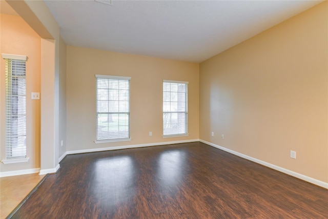 18015 Secret Branch Ln, Cypress, TX 77433 - spare room featuring dark wood-style flooring and baseboards