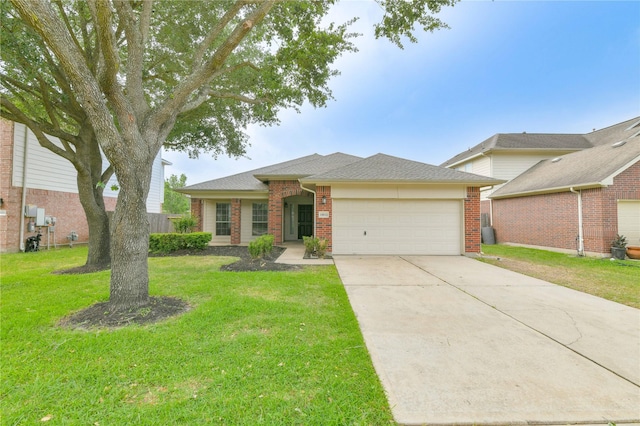 18015 Secret Branch Ln, Cypress, TX 77433 - view of front of home featuring a garage, brick siding, concrete driveway, a front lawn, and a shingled roof