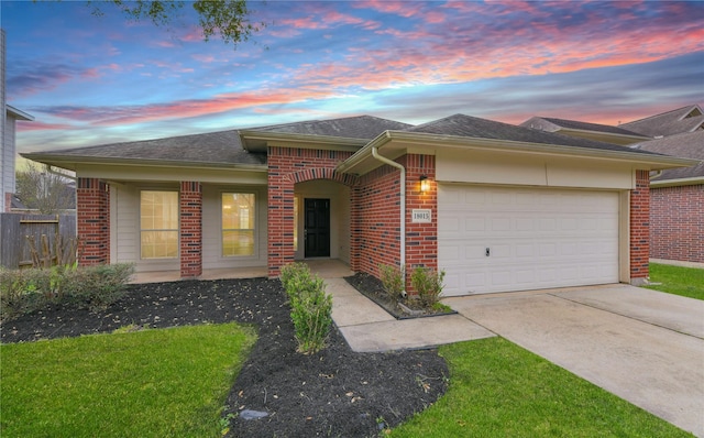 18015 Secret Branch Ln, Cypress, TX 77433 - single story home featuring brick siding, a garage, concrete driveway, and roof with shingles