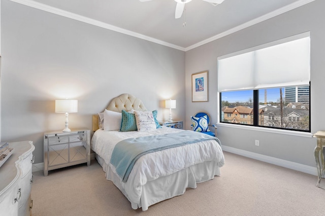 308 W Saulnier St, Houston, TX 77019 - bedroom featuring carpet flooring, crown molding, baseboards, and ceiling fan