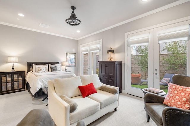 308 W Saulnier St, Houston, TX 77019 - bedroom featuring light colored carpet, visible vents, ornamental molding, and access to outside