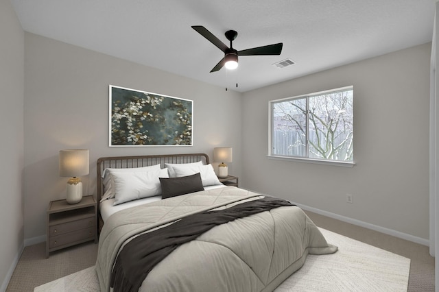 82 S Regan Mead Cir, Montgomery, TX 77382 - bedroom featuring light colored carpet, baseboards, and ceiling fan