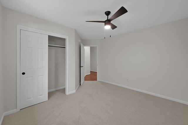 82 S Regan Mead Cir, Montgomery, TX 77382 - unfurnished bedroom with light carpet, baseboards, a closet, and ceiling fan