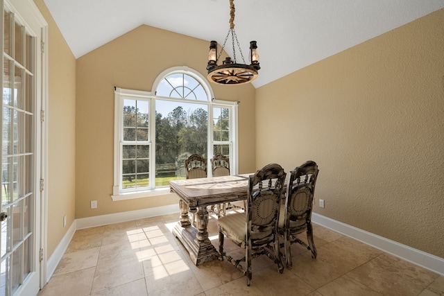 8536 Prince William Ct, Montgomery, TX 77316 - dining space featuring healthy amount of natural light, a chandelier, lofted ceiling, a textured wall, and light tile patterned floors