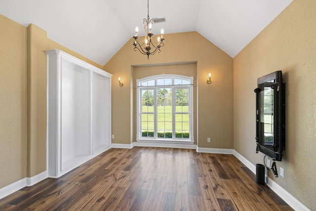 8536 Prince William Ct, Montgomery, TX 77316 - foyer featuring a chandelier, dark wood finished floors, lofted ceiling, and baseboards