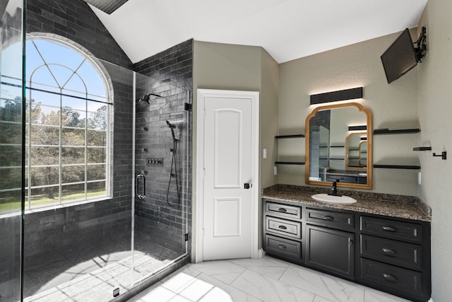 8536 Prince William Ct, Montgomery, TX 77316 - full bathroom with vaulted ceiling, a shower stall, vanity, and marble finish floors