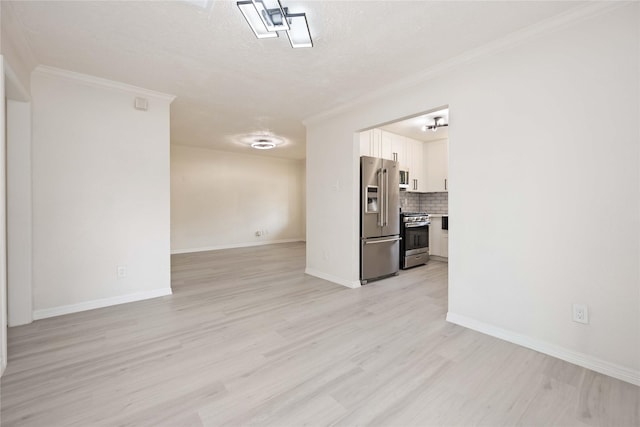unfurnished living room with baseboards, a textured ceiling, crown molding, and light wood finished floors