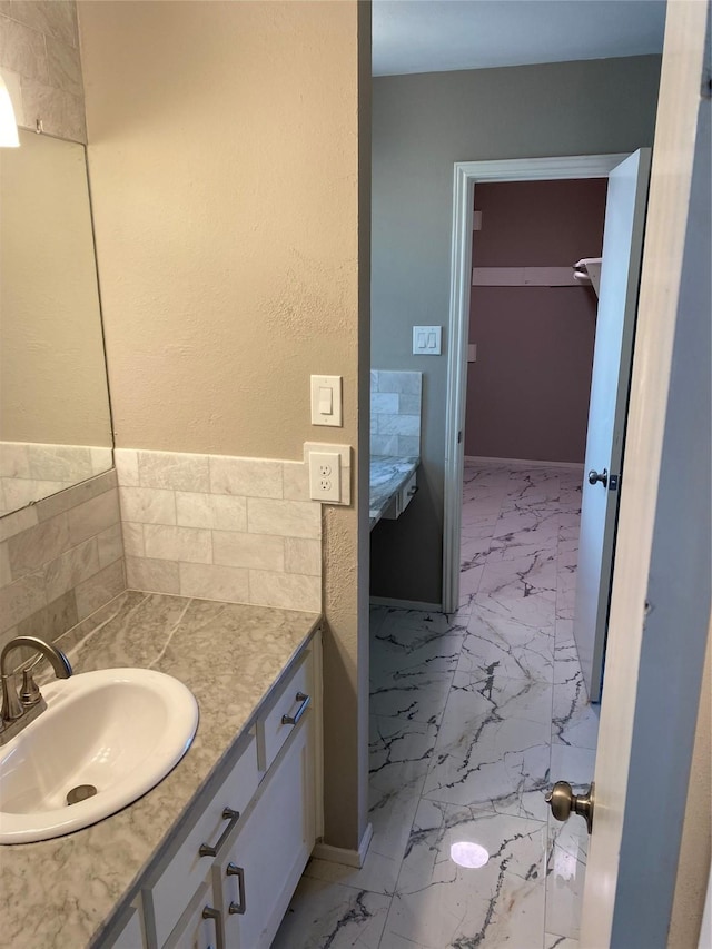 1803 Rampart St, League City, TX 77573 - bathroom with vanity and marble finish floor