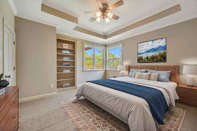 2023 Greenwood Oaks Dr, Houston, TX 77062 - carpeted bedroom featuring visible vents, a ceiling fan, a tray ceiling, crown molding, and baseboards
