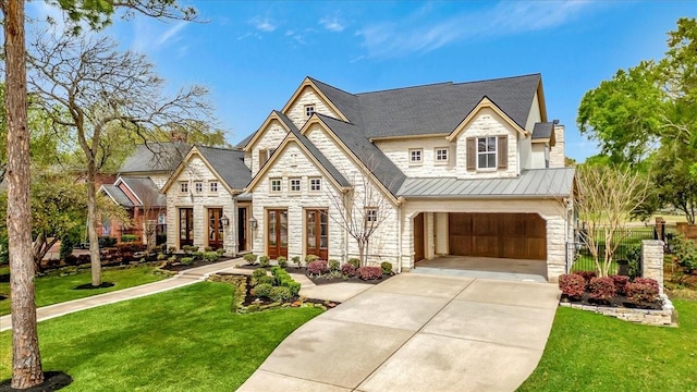 2023 Greenwood Oaks Dr, Houston, TX 77062 - view of front of home featuring a front yard, an attached garage, stone siding, and driveway