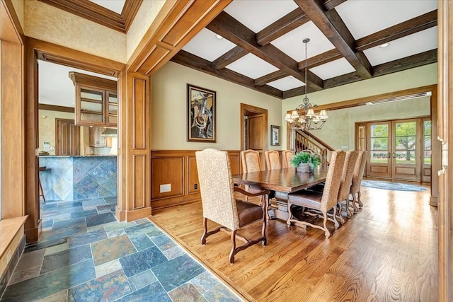 2023 Greenwood Oaks Dr, Houston, TX 77062 - dining area featuring beamed ceiling, french doors, an inviting chandelier, wood finished floors, and coffered ceiling