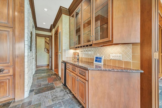 2023 Greenwood Oaks Dr, Houston, TX 77062 - bar featuring backsplash, crown molding, beverage cooler, a dry bar, and stone tile flooring