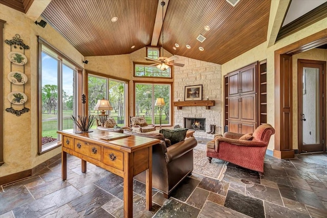 2023 Greenwood Oaks Dr, Houston, TX 77062 - living area with stone tile flooring, a healthy amount of sunlight, wood ceiling, and a ceiling fan