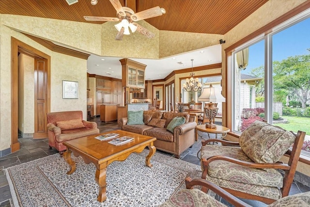 2023 Greenwood Oaks Dr, Houston, TX 77062 - living area featuring crown molding, stone tile floors, ceiling fan with notable chandelier, wooden ceiling, and high vaulted ceiling