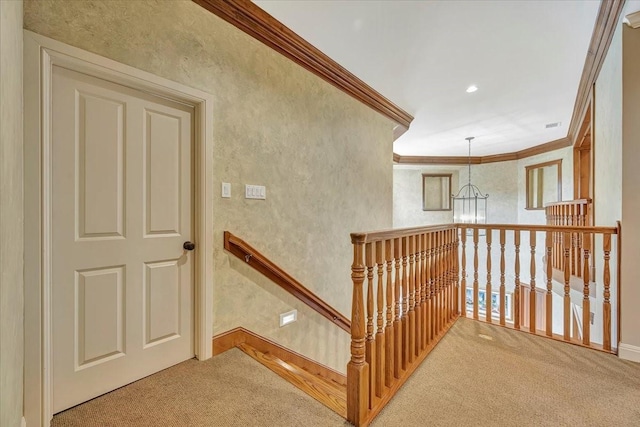 2023 Greenwood Oaks Dr, Houston, TX 77062 - staircase with crown molding, a notable chandelier, a textured wall, and carpet floors