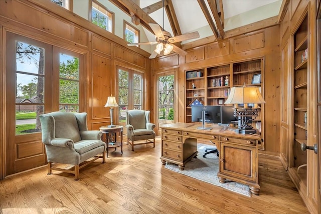 2023 Greenwood Oaks Dr, Houston, TX 77062 - office featuring ceiling fan, light wood-style floors, a healthy amount of sunlight, and wood walls