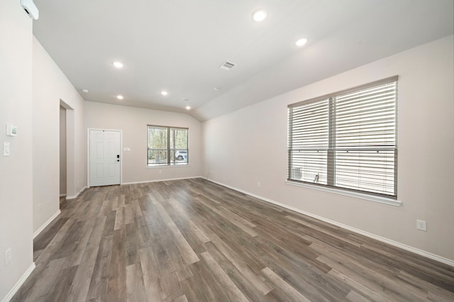 5899 Skylane Dr, Montgomery, TX 77316 - empty room featuring wood finished floors, baseboards, recessed lighting, and vaulted ceiling