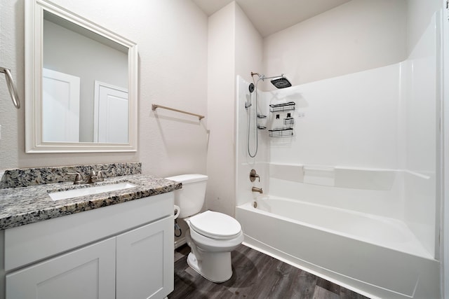 5899 Skylane Dr, Montgomery, TX 77316 - full bath featuring wood finished floors, toilet, vanity, and shower / bathtub combination