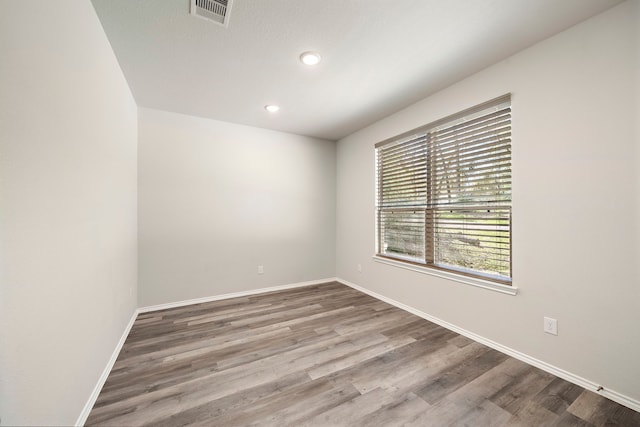 5899 Skylane Dr, Montgomery, TX 77316 - empty room featuring baseboards, wood finished floors, and recessed lighting