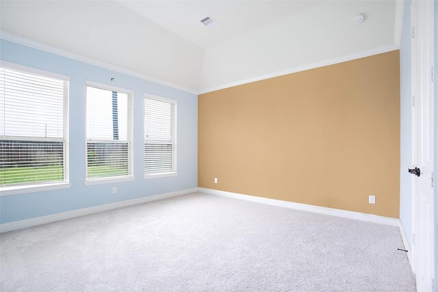 7611 Irby Cobb Blvd, Richmond, TX 77469 - spare room featuring visible vents, light colored carpet, baseboards, and ornamental molding
