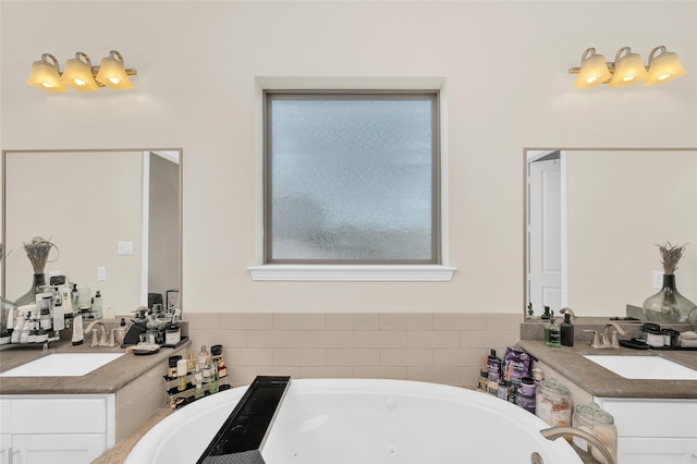 4314 Gibson St Unit A, Houston, TX 77007 - bathroom featuring two vanities and a jetted tub