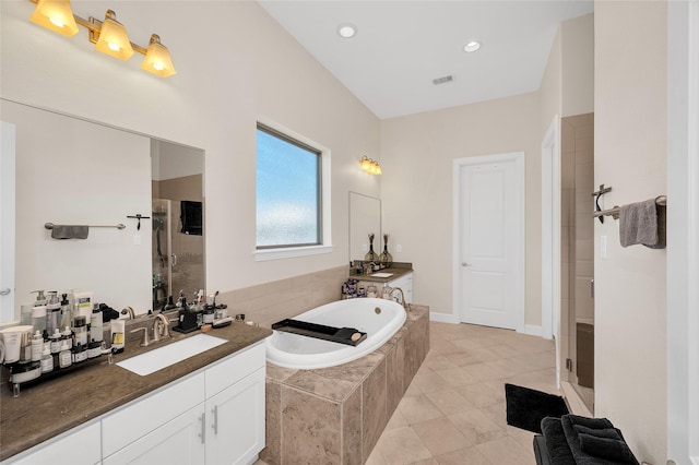 4314 Gibson St Unit A, Houston, TX 77007 - full bath featuring a bath, a shower stall, vanity, and tile patterned flooring