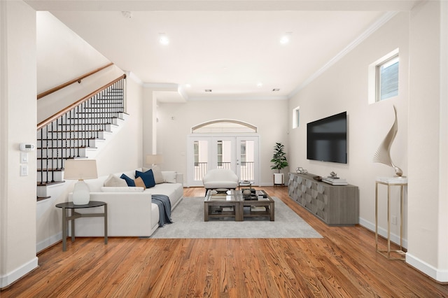 4314 Gibson St Unit A, Houston, TX 77007 - living area with ornamental molding, wood finished floors, and stairway