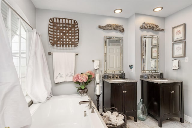834 Lamonte Ln, Houston, TX 77018 - full bathroom with a sink, a bath, two vanities, and recessed lighting