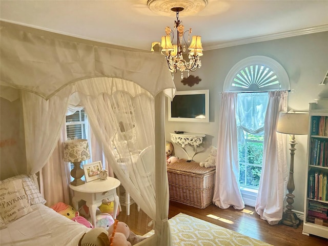 834 Lamonte Ln, Houston, TX 77018 - bedroom with a notable chandelier, crown molding, and wood finished floors