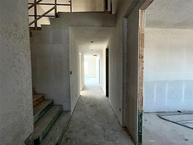 hallway featuring stairway