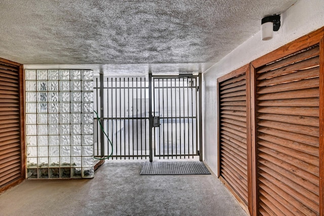 interior space with a textured ceiling