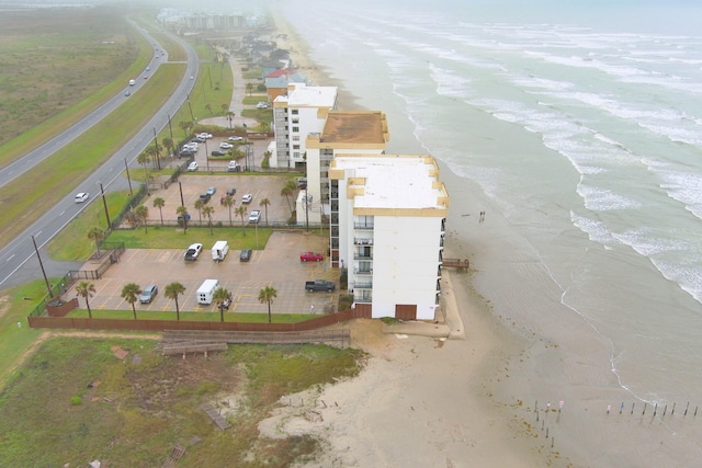 bird's eye view with a beach view and a water view