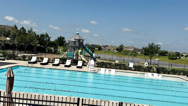 14407 Woodcott Warren Way, Rosharon, TX 77583 - community pool with a patio