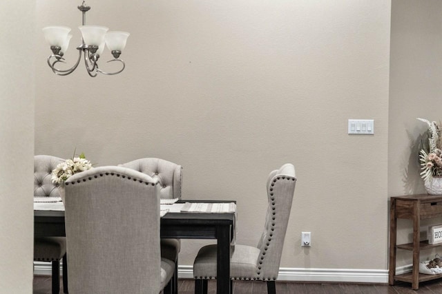 24146 Valencia Ridge Ln, Katy, TX 77494 - dining space featuring a chandelier, baseboards, and wood finished floors
