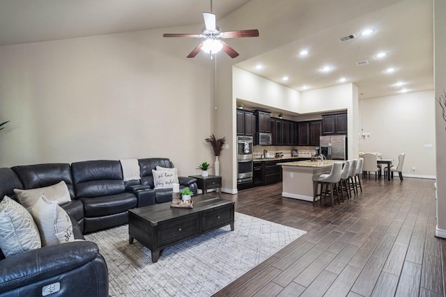 24146 Valencia Ridge Ln, Katy, TX 77494 - living room with visible vents, baseboards, ceiling fan, dark wood finished floors, and recessed lighting