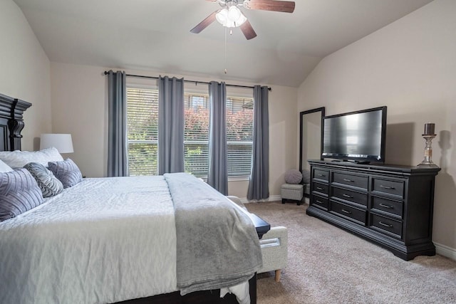 24146 Valencia Ridge Ln, Katy, TX 77494 - bedroom featuring baseboards, lofted ceiling, light colored carpet, and ceiling fan