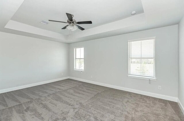 408 Bryan Way, Angleton, TX 77515 - carpeted empty room with a raised ceiling and ceiling fan
