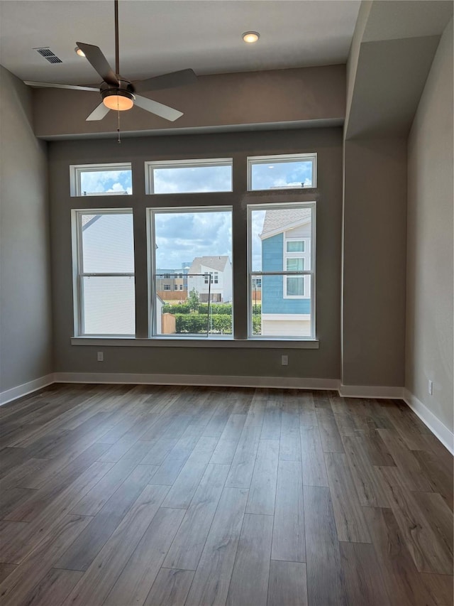 16040 Mason Run Dr, Houston, TX 77079 - empty room featuring a ceiling fan, dark wood-type flooring, and recessed lighting