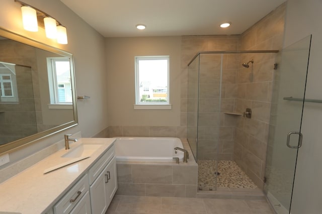 16040 Mason Run Dr, Houston, TX 77079 - bathroom featuring a garden tub, vanity, a stall shower, recessed lighting, and tile patterned flooring