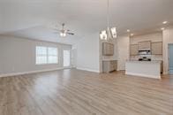 416 Bryan Way, Angleton, TX 77515 - unfurnished living room featuring light wood-type flooring and ceiling fan
