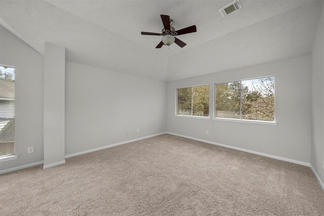 16935 Valley Palms Dr, Spring, TX 77379 - unfurnished room with carpet flooring, healthy amount of natural light, a ceiling fan, and lofted ceiling