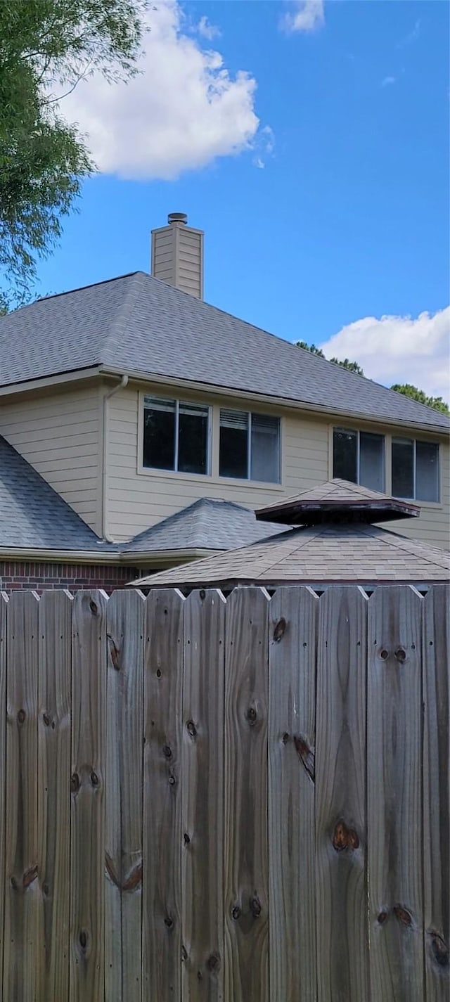 16935 Valley Palms Dr, Spring, TX 77379 - view of property exterior featuring a chimney