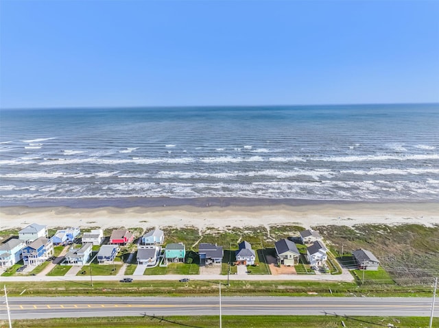 23155 Gulf Dr, Galveston, TX 77554 - bird's eye view featuring a residential view, a view of the beach, and a water view