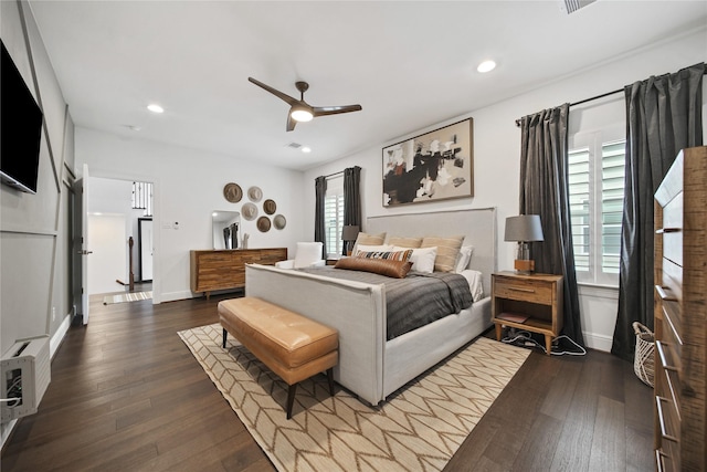 bedroom featuring recessed lighting, dark wood-type flooring, and baseboards