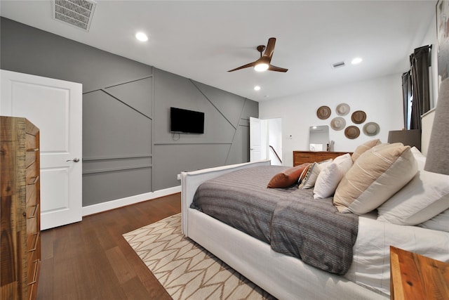 bedroom with recessed lighting, visible vents, ceiling fan, and wood finished floors