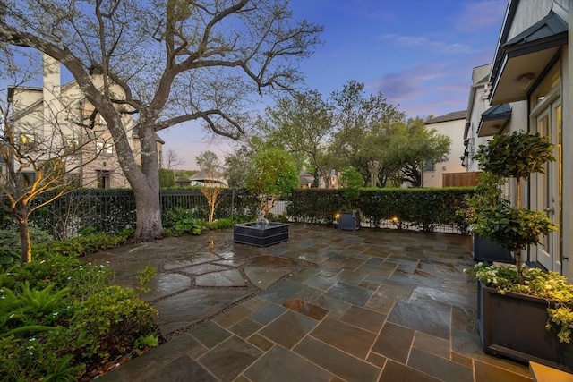 3126 Mid Ln, Houston, TX 77027 - patio terrace at dusk featuring a patio area