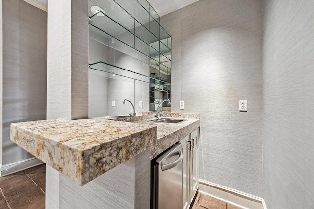 3126 Mid Ln, Houston, TX 77027 - kitchen with tile patterned flooring and light stone counters